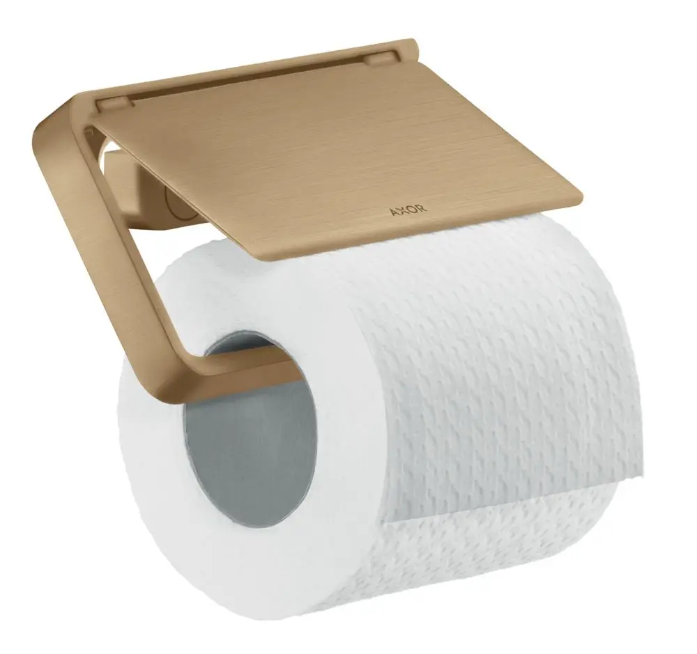 Toilettenpapierhalter aus gebürstetem Bronze mit einem Deckel, montiert an einer Wand, präsentiert von der Marke AXOR. Der Papierhalter ist mit einer Rolle Toilettenpapier bestückt.